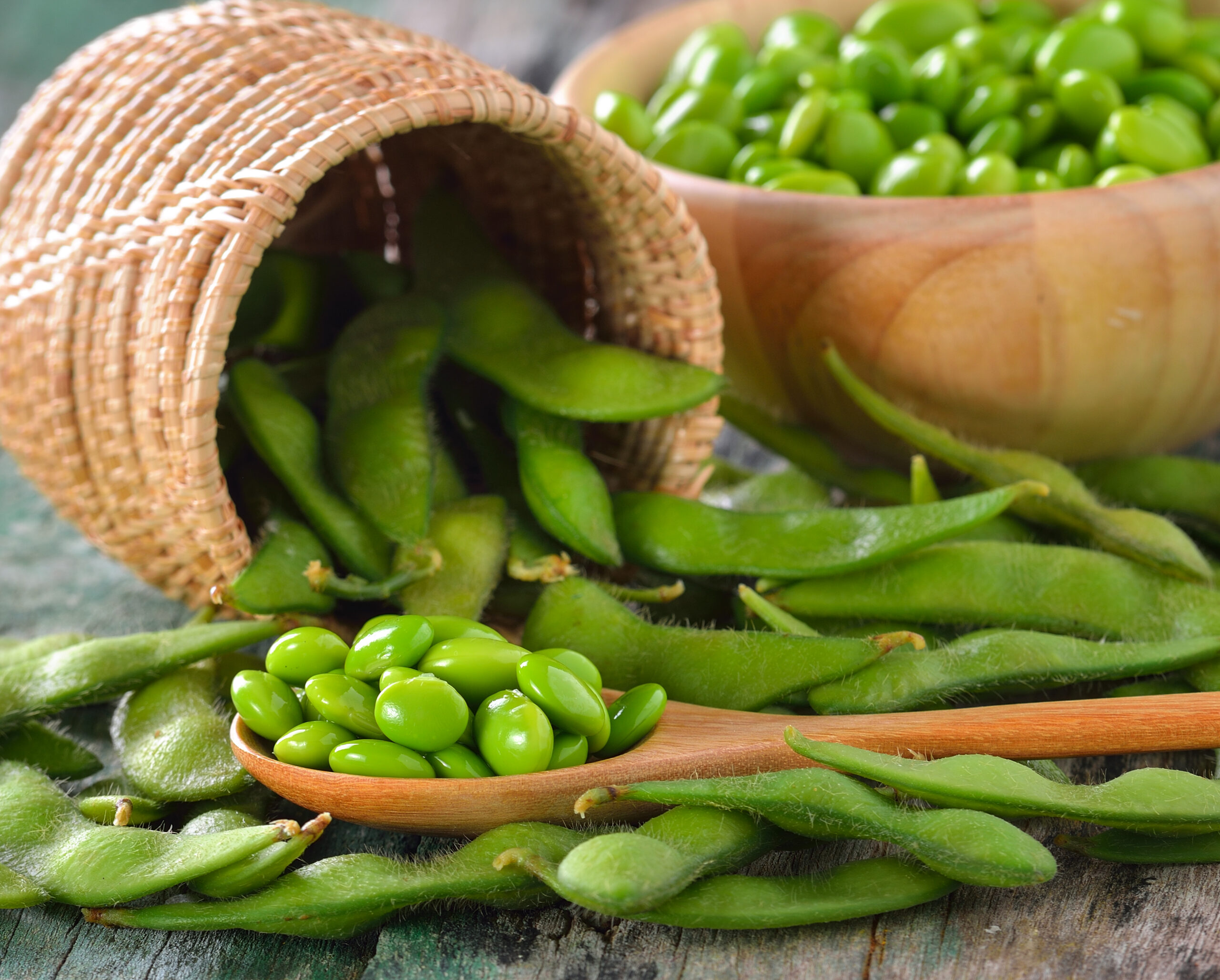 green soy beans in the basket on table