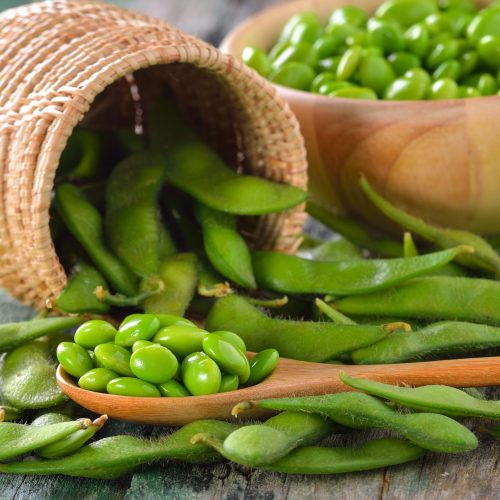 green soy beans in the basket on table