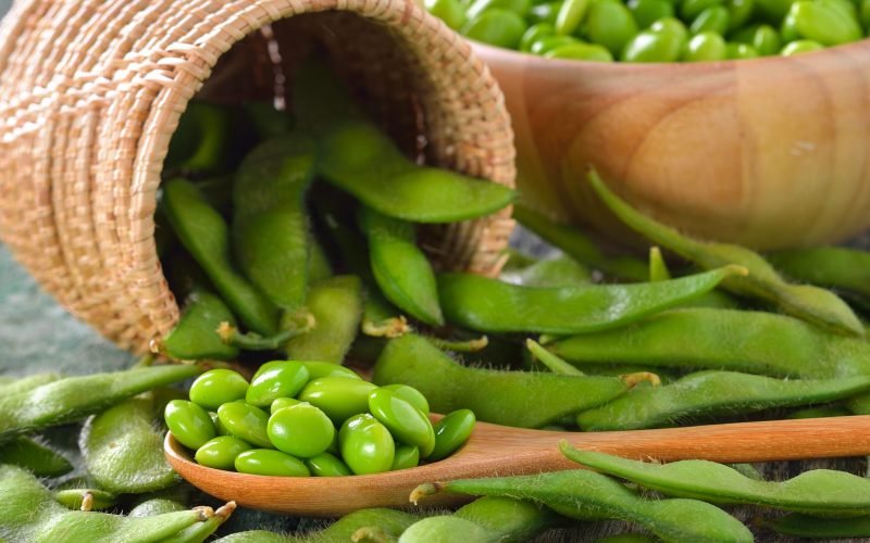 green soy beans in the basket on table